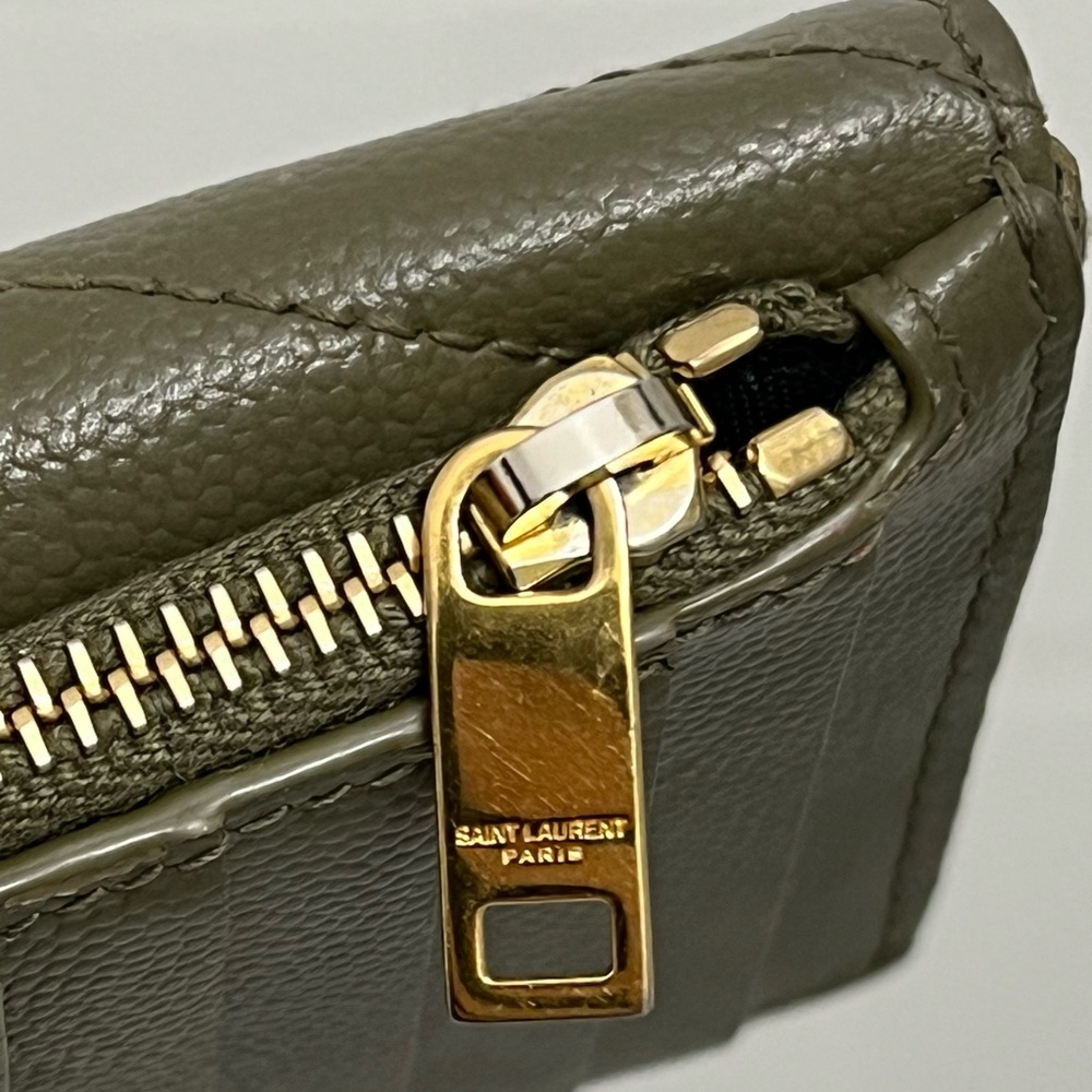 SOLD OFF POSHMARK 
Cassandre YSL Monogram Leather Zip Card Holder - Picture 8 of 16